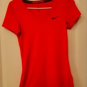 Womens Nike Pro v-neck dri fit top. Red